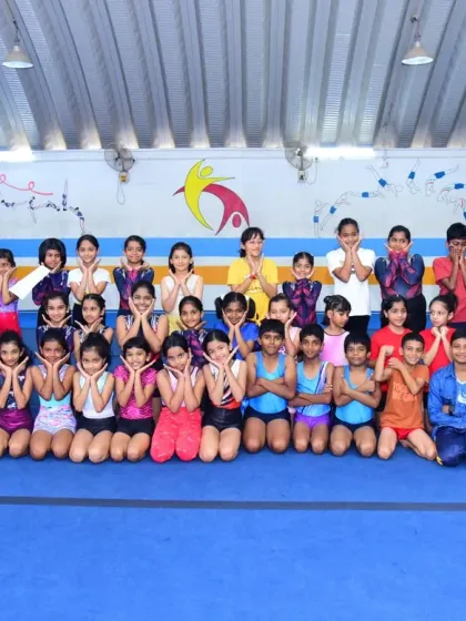 The heart of our academy. A huge group of our young gymnasts sharing a fun moment together. We are more than a gym; we are the Elite Squad family.