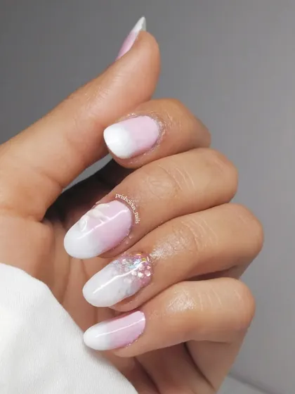 Another angle of the 3D petal nails, showing how they look from the side. The dimension is subtle but adds so much elegance.