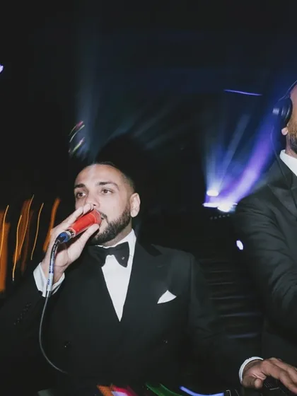 A shot of me and my brother from Kudos Music, DJ Amraj, on the decks at his own wedding at the Natural History Museum. The production, handled by Kudos AV, was flawless.
