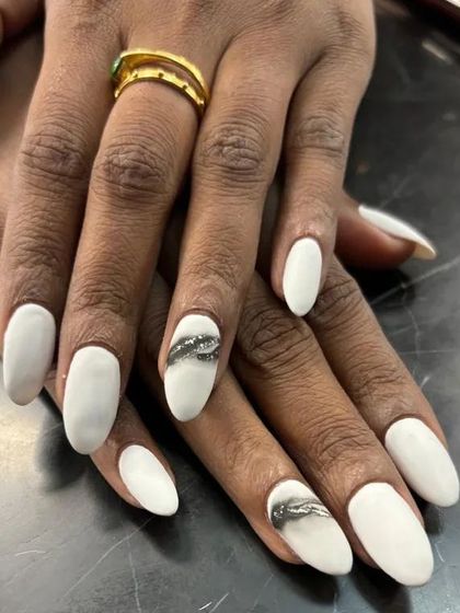 Another angle of this chic and modern manicure, showing how the accent nail provides a perfect pop of contrast.