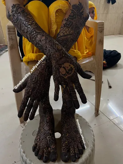 Presenting bride Kashifa's stunning full bridal mehendi, with intricate work covering her hands, arms, and feet.
