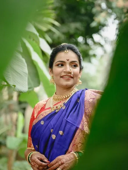 Using the natural foliage to frame the bride. This portrait of Sanika has a lovely, soft feel, capturing a quiet moment of reflection before the wedding buzz began.