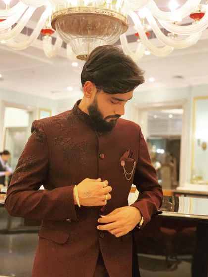 A final adjustment before heading to the stage in Siliguri.