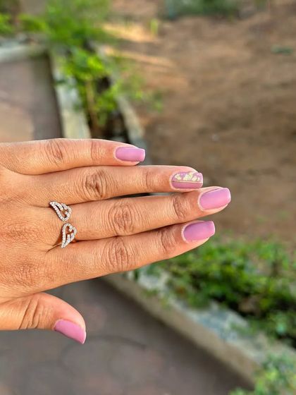 Summer special nails with gold foil detailing. The simple pink base really makes the gold pop.