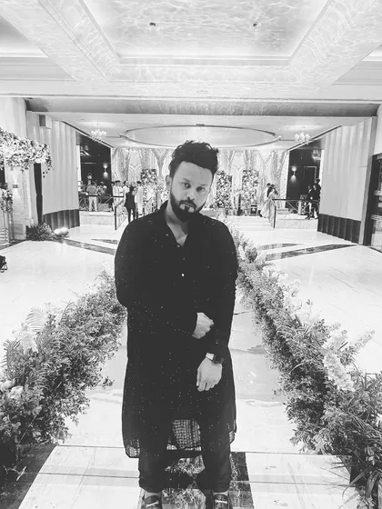 Dressed in traditional attire, ready to kick off the wedding festivities. I always match my look to the event's theme.