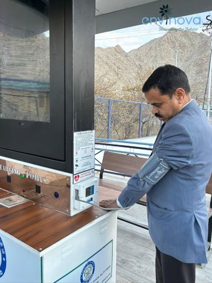 A dignitary tests the integrated blood pressure monitoring system at our Leh installation. We adapt our technology to meet specific location-based needs, prioritizing the health and well-being of users, especially in extreme environments.