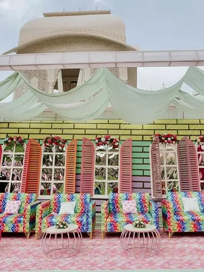Another angle of the colorful window-paneled photo wall, a popular spot for guests at this vibrant carnival Mehendi.