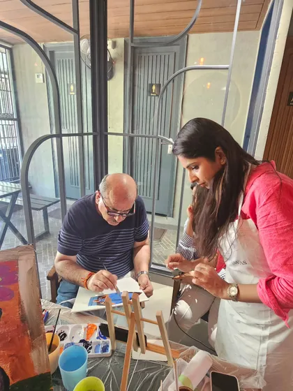 I believe in providing gentle guidance to help every guest feel confident. Here I am assisting a participant, ensuring he has a relaxing and enjoyable experience.