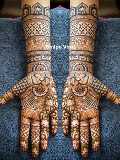 A client-chosen design that I brought to life. This full-arm piece is filled with geometric bands, floral elements, and mandalas.