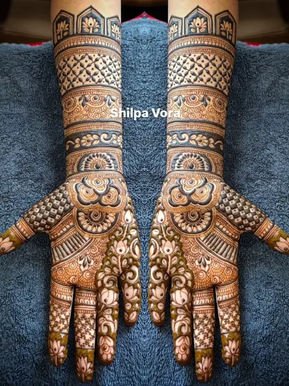 A client-chosen design that I brought to life. This full-arm piece is filled with geometric bands, floral elements, and mandalas.