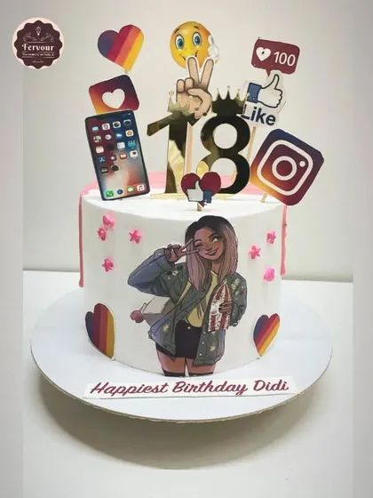An 18th birthday cake for a social media lover. This fresh fruit cake is decorated with edible logos of Instagram, emojis, and other trendy icons.