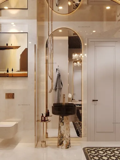 We transform washrooms and dressers into an organized lifestyle upgrade. This space combines form and function with custom storage, elegant gold accents, and our signature use of curves to create a calm, convenient, and classy personal area.