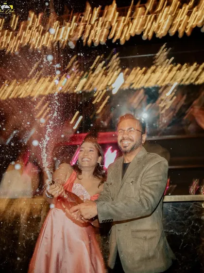 A champagne pop to kick off the cocktail party. The motion and joy in this shot are what we aim to capture.
