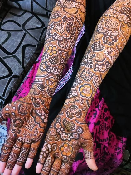 This design uses negative space to create a striking contrast, making the floral and geometric patterns stand out.