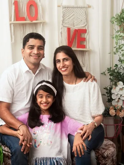 A classic family portrait in my boho-themed studio setup. This setting provides a warm and stylish backdrop for families of all sizes.