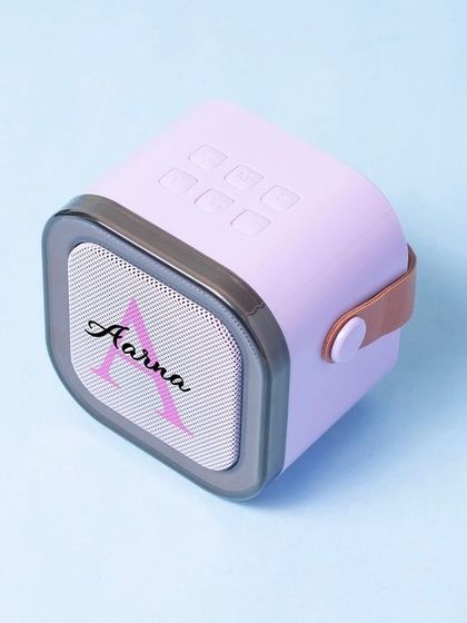 A closer look at the top of our personalised speaker, showing the easy-to-use buttons.