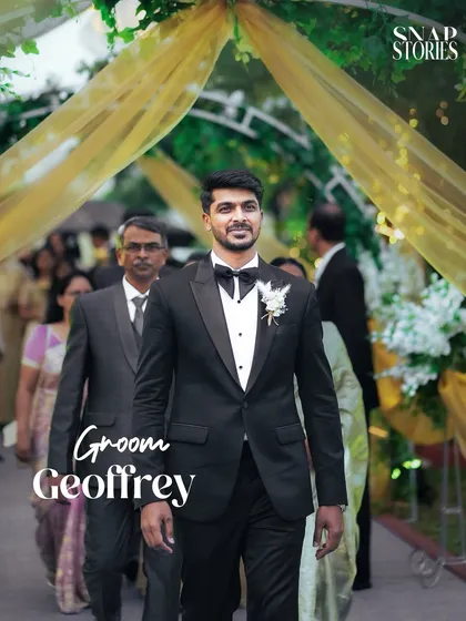 The groom makes a dapper entrance in a classic black tuxedo. We ensure the groom's entry is captured with the same importance and style as the bride's.