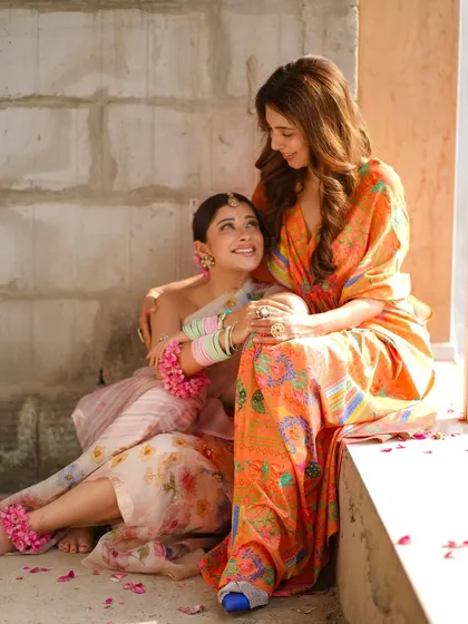A sweet, candid moment with the beautiful Nyra Banerjee during our floral-themed shoot. Her cheerful energy is absolutely infectious.