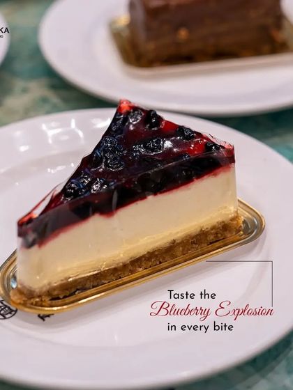 A blueberry explosion in every bite. Our Blueberry Cheesecake features a creamy, rich cheesecake topped with a tangy and sweet blueberry compote.