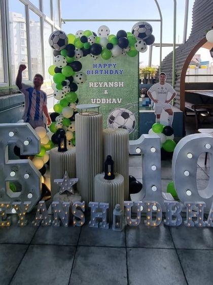 Another angle of the joint football-themed birthday celebration.