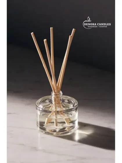 This shot captures the simple elegance of my classic reed diffuser. The clear fragrance oil and natural reeds are perfect for those who appreciate understated luxury.