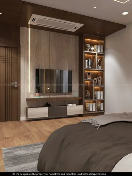 This master bedroom features a built-in TV unit with an integrated bookshelf, creating a functional and beautiful focal point.