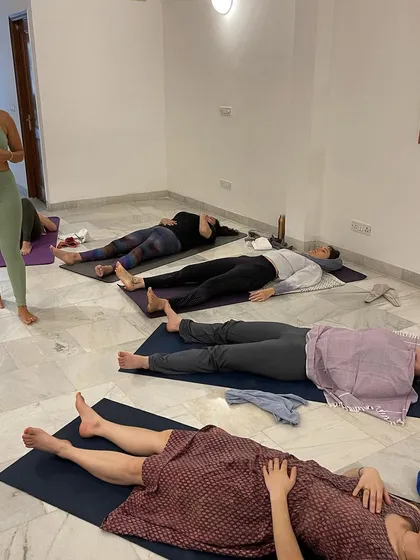 Students resting after a powerful breathwork session. The peace in the room is a testament to the healing power of conscious, connected breathing.