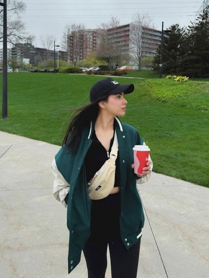 A three-quarter shot of the same outfit, giving a better look at the jacket and accessories.