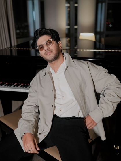 A close-up of Dulquer's Dubai look. The neutral tones and clean lines are hallmarks of the 'silent luxury' trend, which I love to incorporate into my styling.