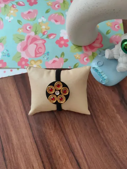 My collection of decorative elastic hair bands. Each one features a unique handmade centerpiece, including gotapatti, Kundan work, zardozi, and bead embroidery.