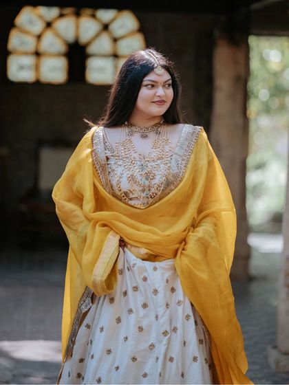 Crimson and Cherry - Full-Service Wedding Planning & Execution Joyful Haldi Ceremonies photo 11