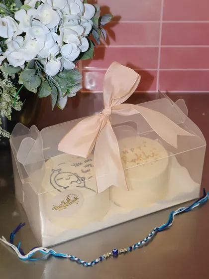 The perfect gift for Rakhi. This set of two bento cakes comes in a beautiful clear box tied with a ribbon, ready to surprise your favorite sibling.