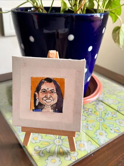 A tiny watercolour portrait of my best friend, Swati, set on a mini easel. I admire her passion for life and, of course, for nail art!