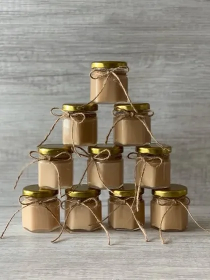 Our mini scented candles in hexagonal jars are another great budget-friendly option. The jute string adds a lovely rustic touch.