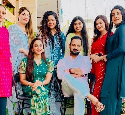 A relaxed moment with the women of my professional family during our festive gathering. Creating a comfortable and respectful workplace is a top priority.