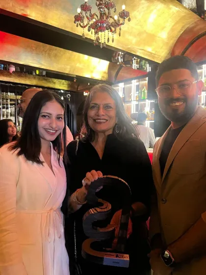 My mother, Sunita Kohli, holding our D/List award and celebrating with fellow attendees. These events are a wonderful opportunity to connect with the vibrant design community.