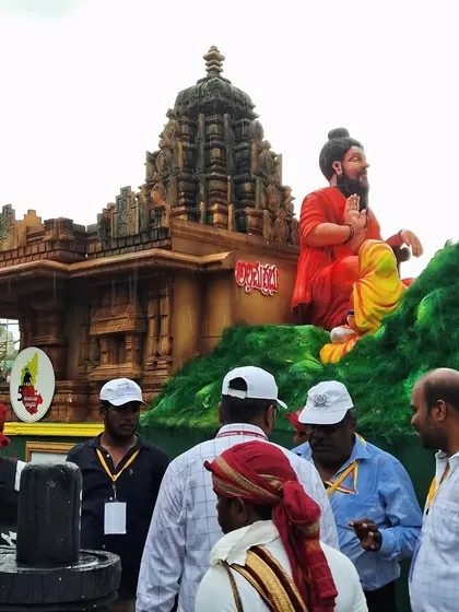 This float, featuring a sage before a temple, is one of my proudest creations. I designed it for a major festival parade, focusing on the intricate details of the temple structure and the peaceful expression of the sage to create a powerful, moving spectacle.
