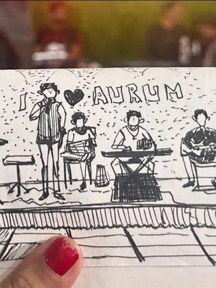 There's nothing like the energy of live music, and I love capturing it in my sketchbook. This is a quick ink drawing I did of an orchestra, capturing the entire band on stage. It shows how I can sketch not just people, but the whole atmosphere of an event.