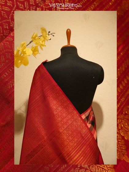 The full drape of the checked Kanjivaram on a mannequin, showcasing its striking and contemporary appeal.