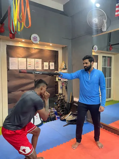 Head movement is key to avoiding getting hit. I use a boxing reflex bar to drill defensive techniques, forcing the student to stay sharp and react quickly.