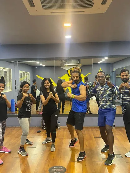 Everyone is welcome to join our fight club. Here is a look at one of our high intensity training workshops, with men and women learning striking stances and techniques together.