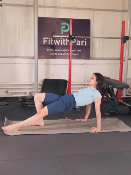 A tabletop bridge with a leg extension. This move strengthens the glutes and hamstrings while opening up the chest and shoulders.