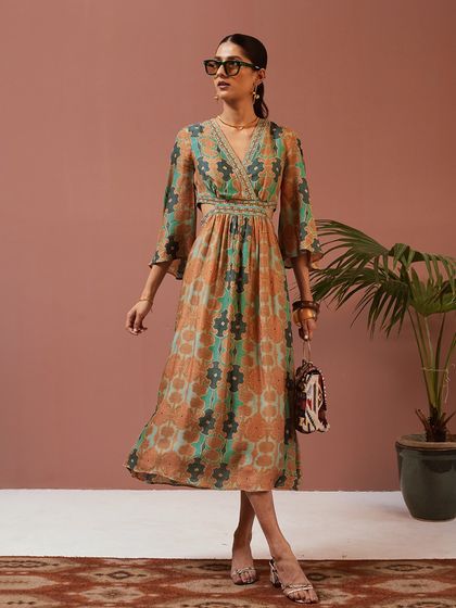 The full look for Ritu Kumar, showing how the dress, accessories, and sunglasses come together for a chic, summer-ready ensemble.