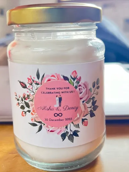 A detailed look at a custom label for a wedding return gift. I work with you to get the design just right, including fonts, graphics, and personal details to match your wedding theme perfectly.