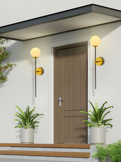 These globe wall sconces look great outdoors as well, framing a doorway and providing a warm welcome.