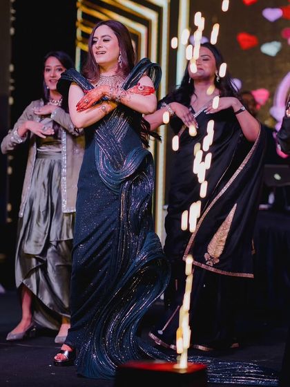 The bride and her team making a grand entrance with sparklers. I help plan these details to add extra drama and excitement to the performance.