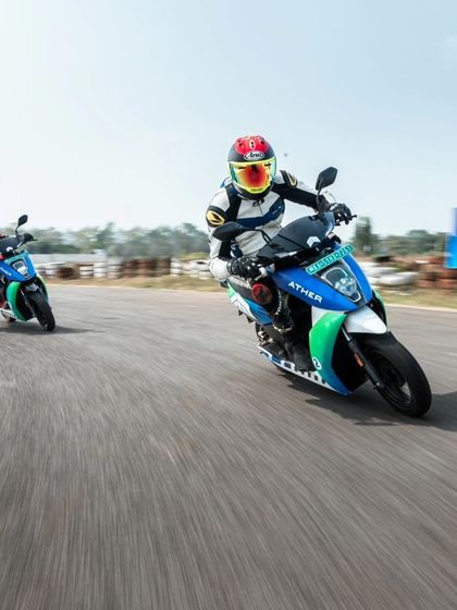 Three Ather electric scooters battling for position on our track. Hosting the EV festival allowed us to showcase the exciting potential of electric vehicle racing to a wide audience.