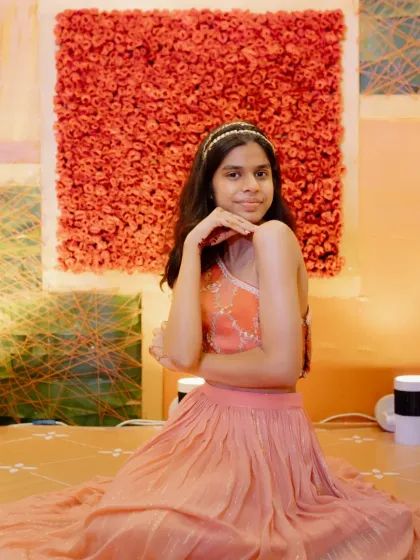 This charming young lady is all smiles in her custom one-shoulder ensemble, showing how a well-fitted outfit can bring so much confidence.