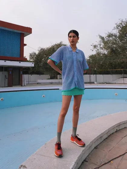 A full-length look from the Rasti India shoot, styled by an empty pool for a cool, retro vibe. This shows my ability to create a unique mood and setting for a brand's collection.