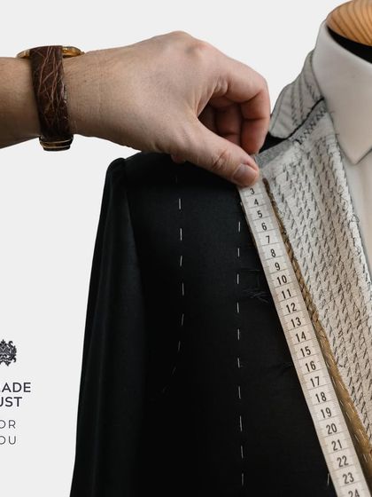 "Made just for you." A bespoke suit is a collaboration. I take precise measurements to ensure that the final garment fits you perfectly, flattering your form and reflecting your personal style.